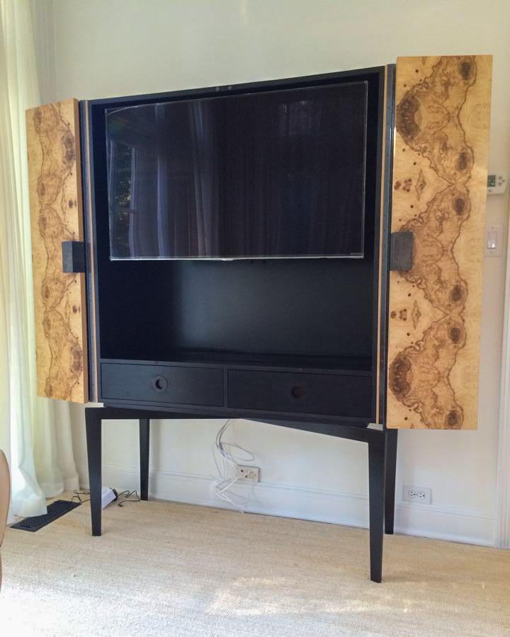 Black TV Stand with Stained Wooden Cabinet Doors