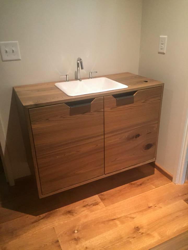 Wooden Vanity with White Sink