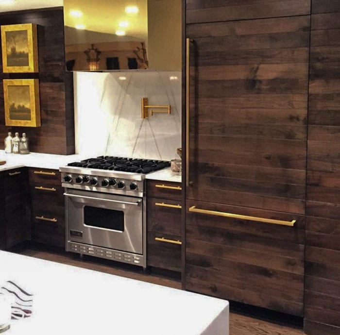 warm walnut and brass cabinetry
