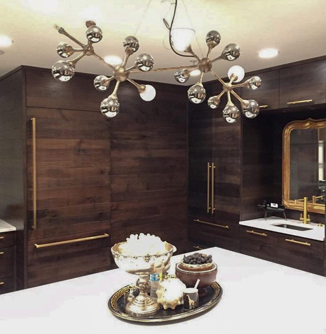 warm walnut and brass cabinets