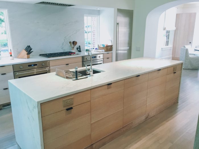 Simple White Oak Kitchen Island with cabinetry