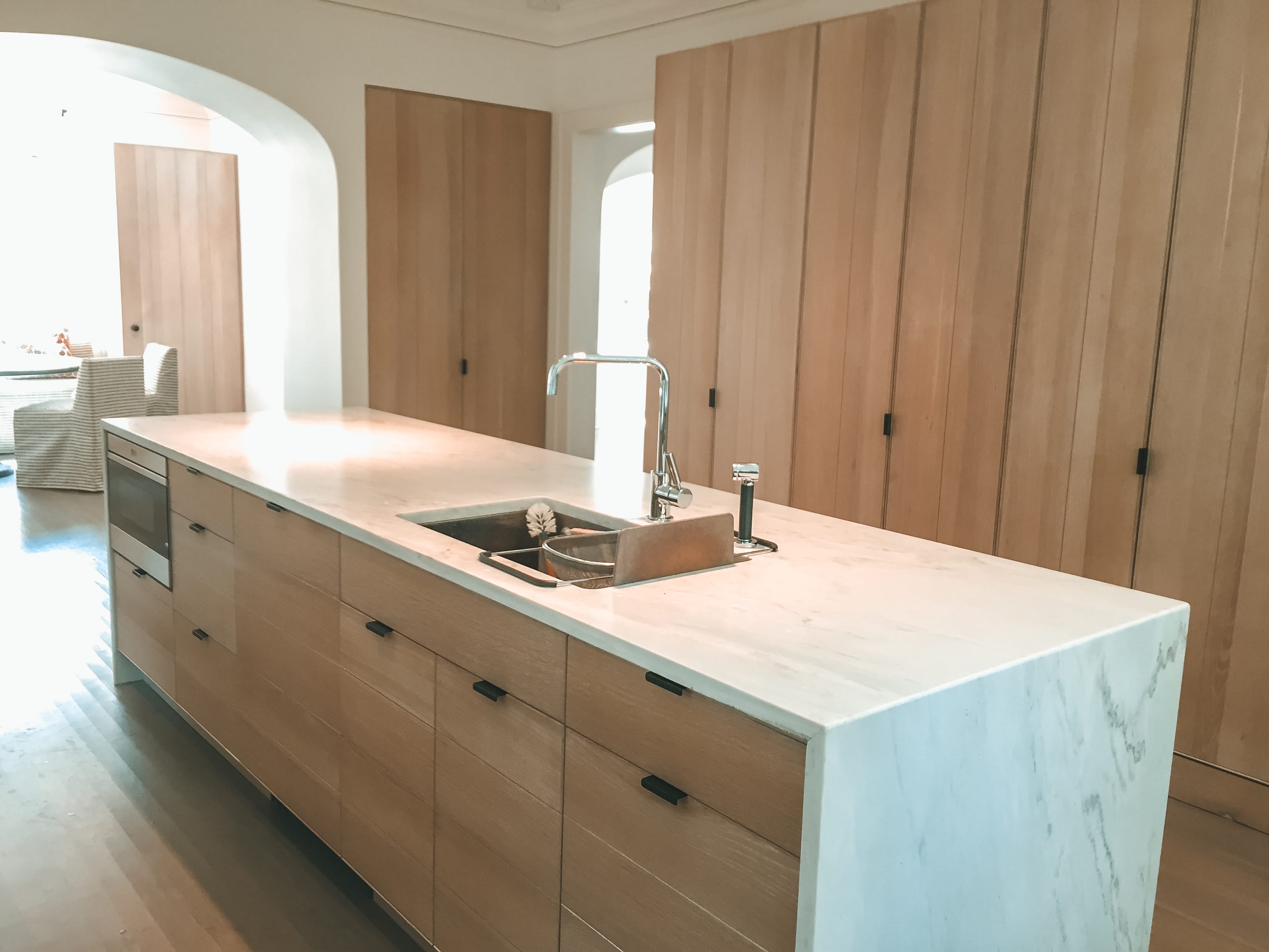 Simple White Oak Kitchen Storage Cabinetry