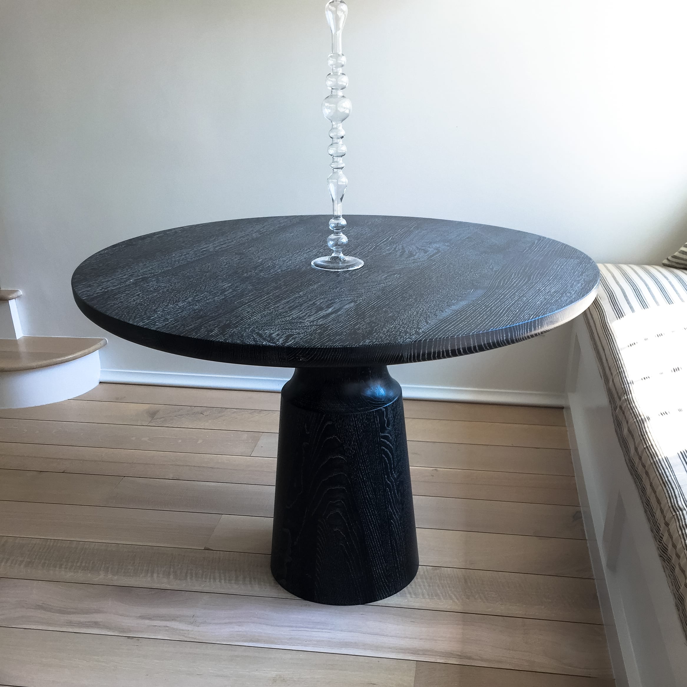 ebonized and cerused solid oak table with accessories