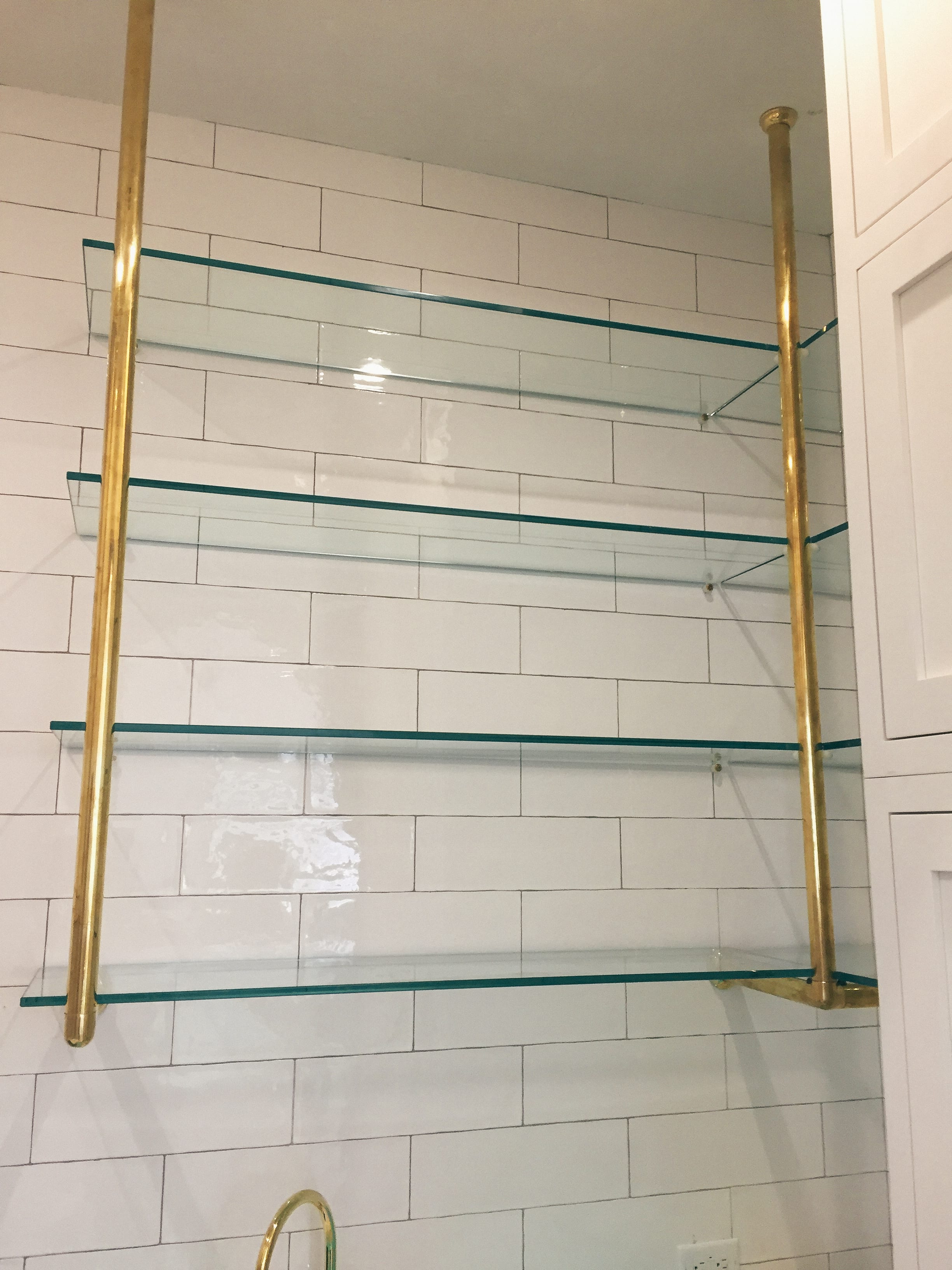 Glass Shelving with Gold Details
