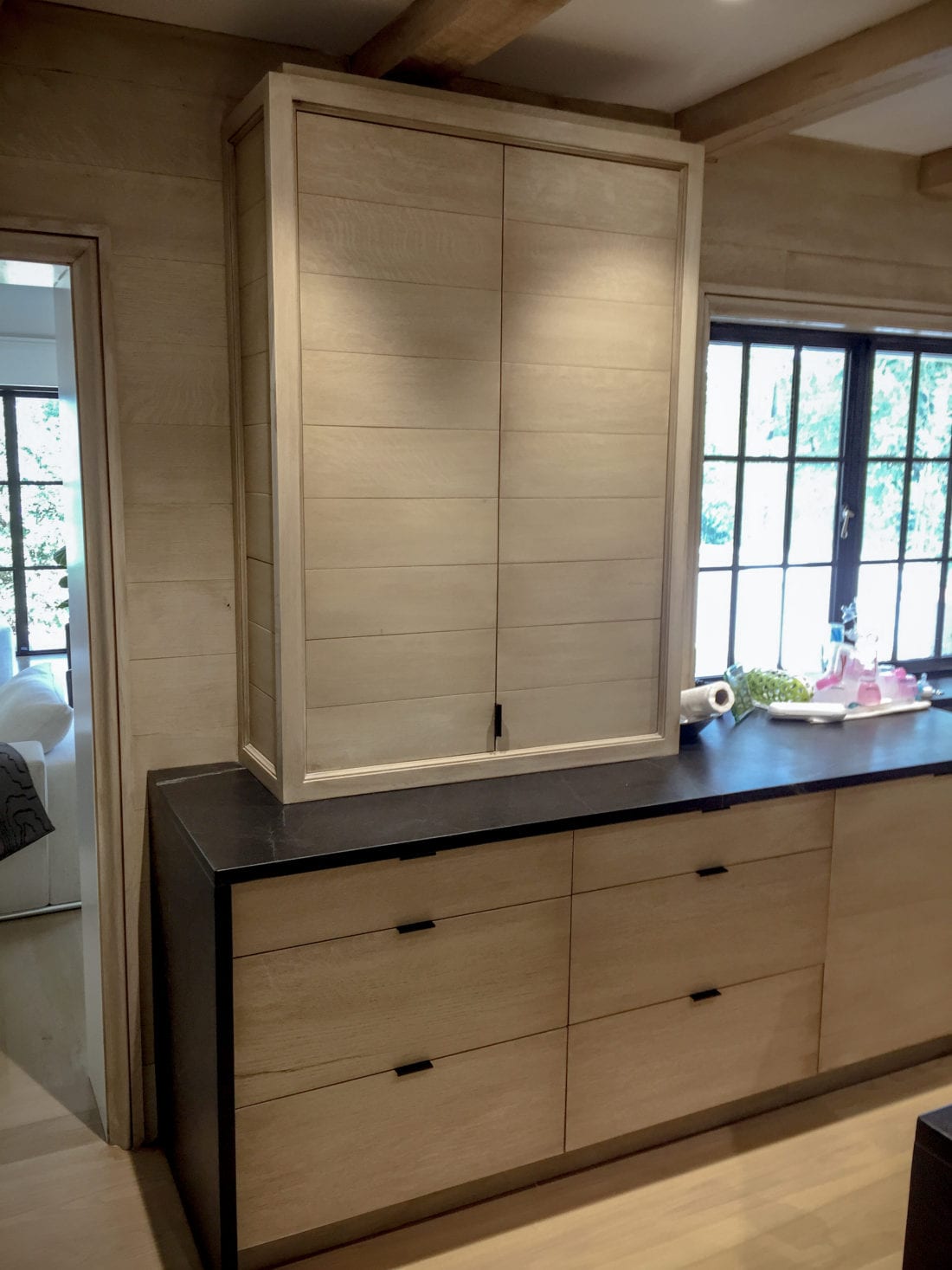 Stainless Steel Kitchen With Light Wood Cabinets close up view
