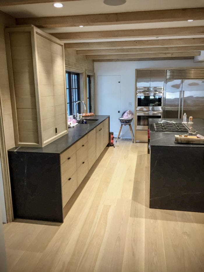 Stainless Steel Kitchen With Light Wood Cabinets