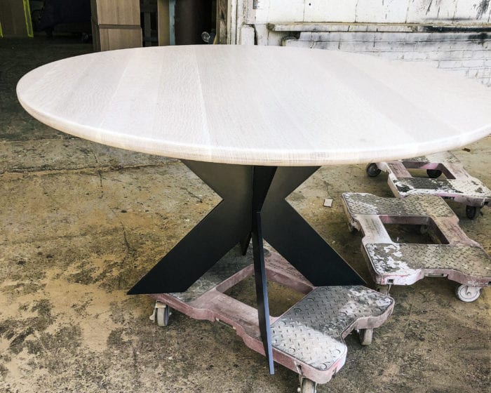 White Oak circular dining table with x legs