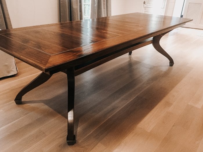 Scraped walnut with ebony inlay dining table
