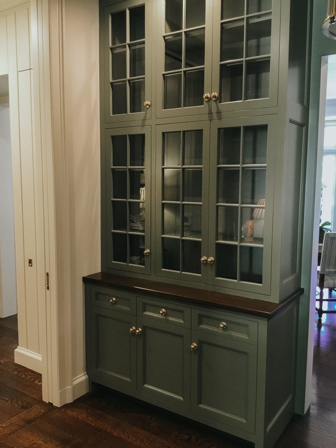 Dark Green Cabinets with Glass Windows