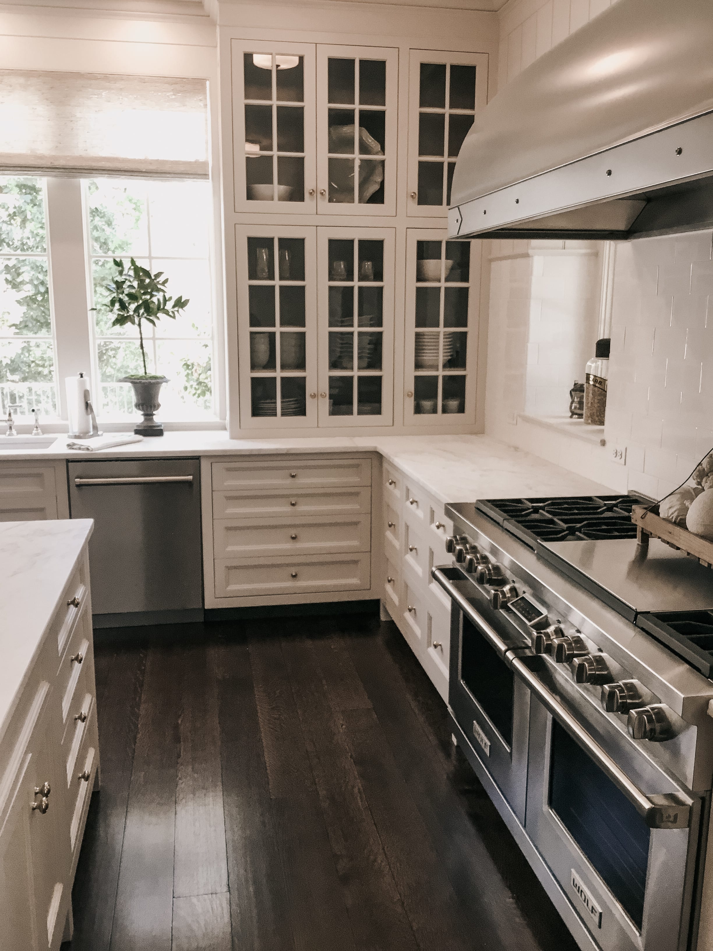 Classic White Kitchen with Glass Front Cabinets