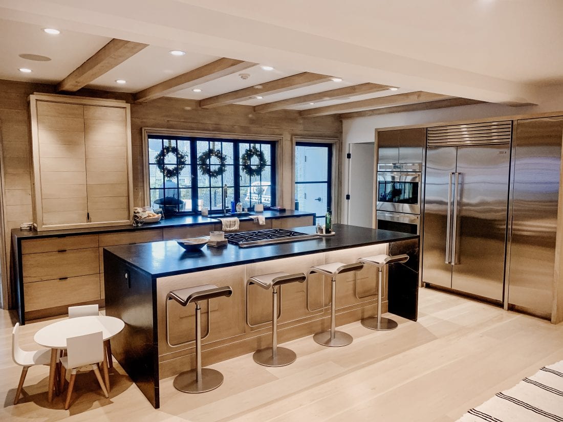 White oak and stainless steel cabinets