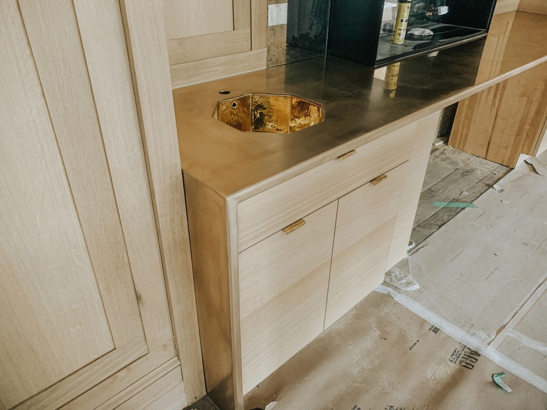 Oak Cabinets with Bronze Countertop