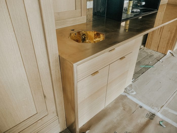 Oak Cabinets with Bronze Countertop