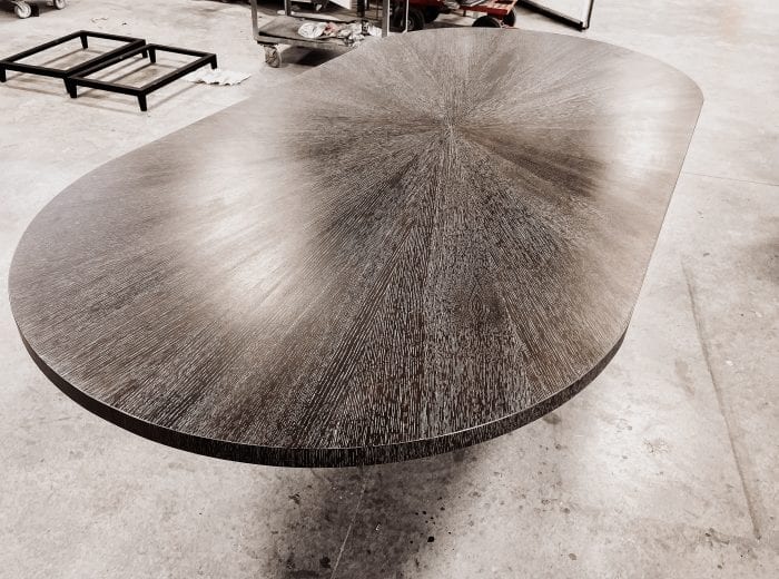 Radiate table in a beautiful gray finish