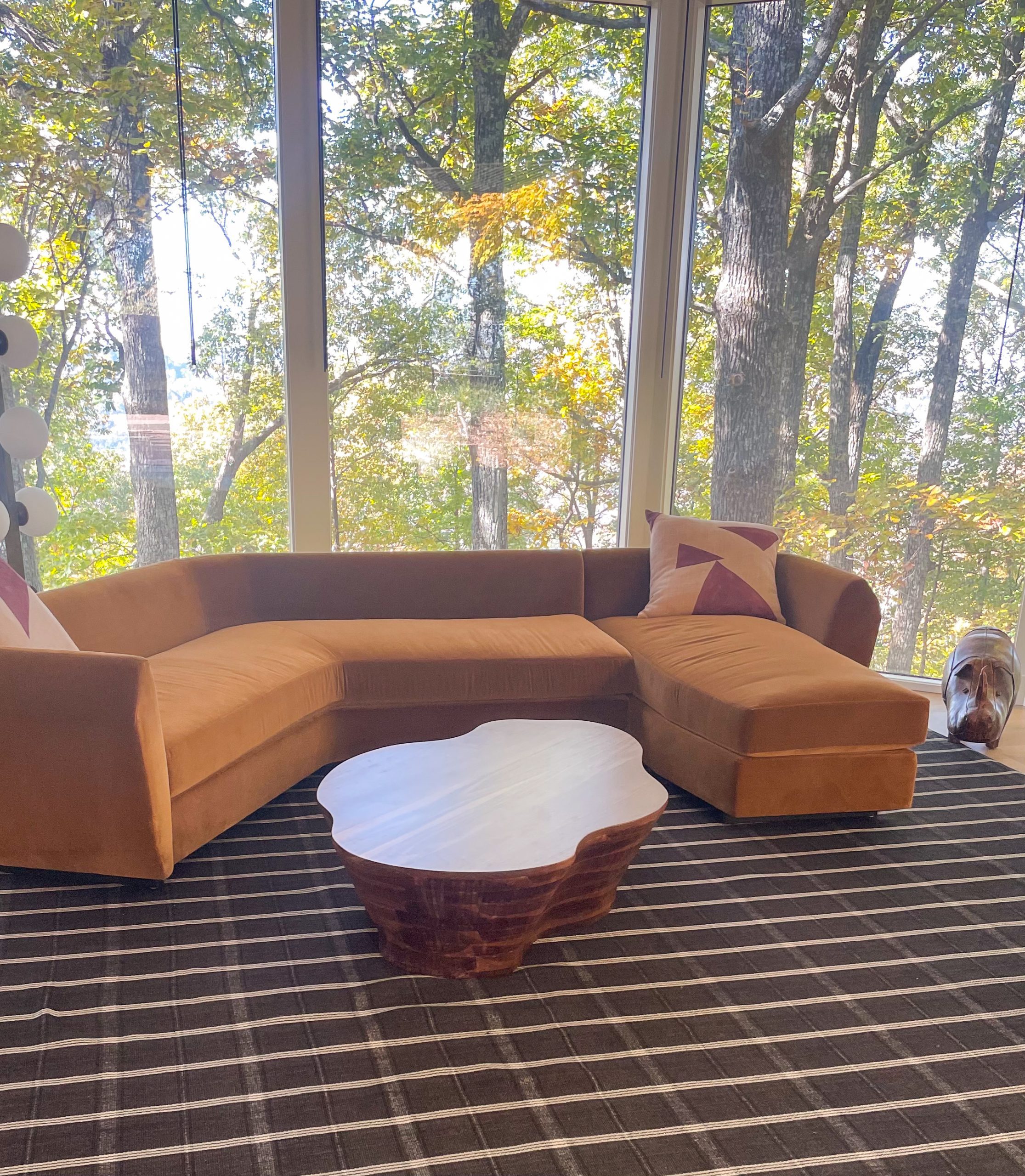 Organic shaped walnut coffee table for this beautiful Nashville mountain home⁠ .⁠