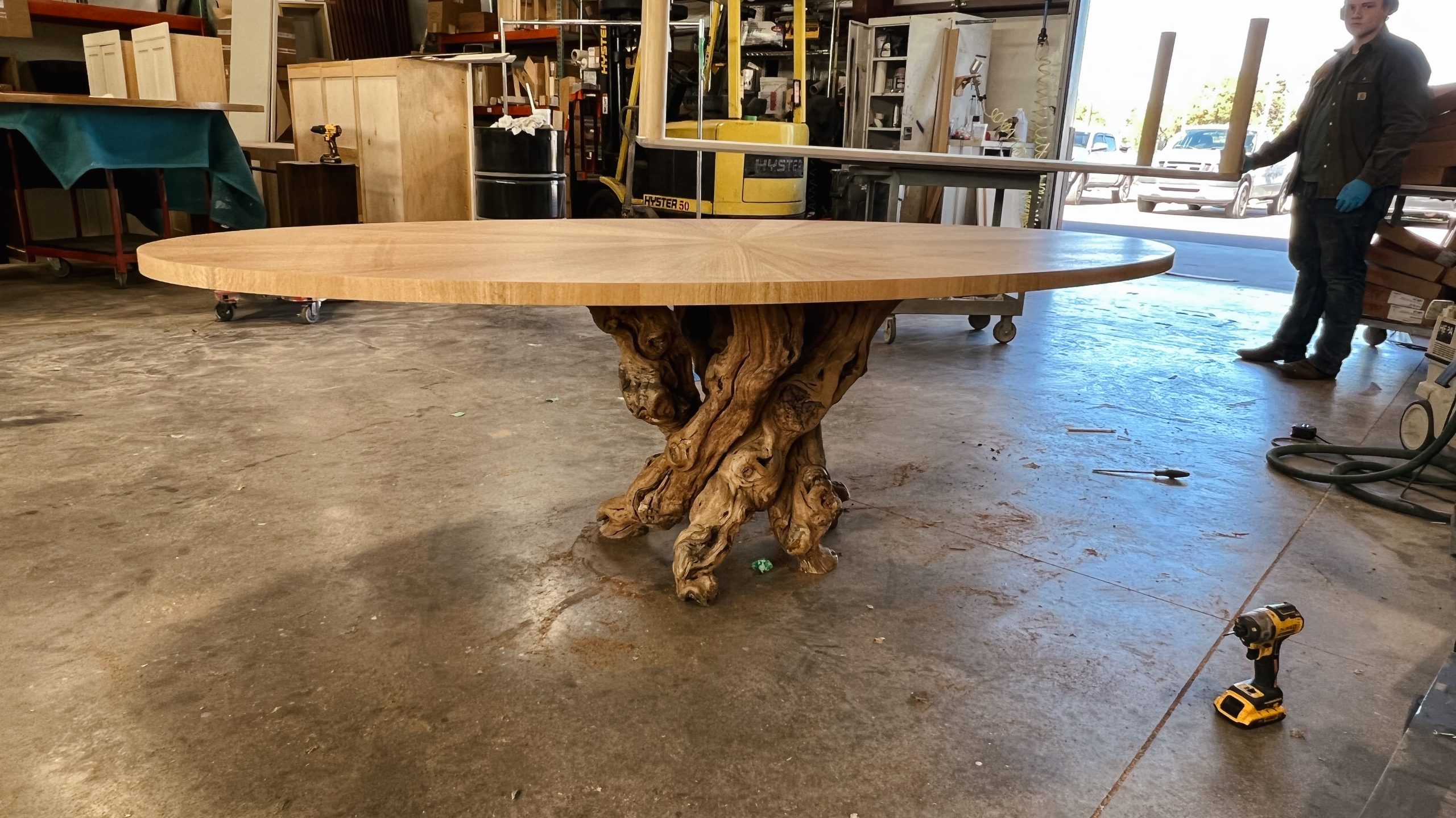 This radiate table the customer provided a tree root for the base for her own personal touch.