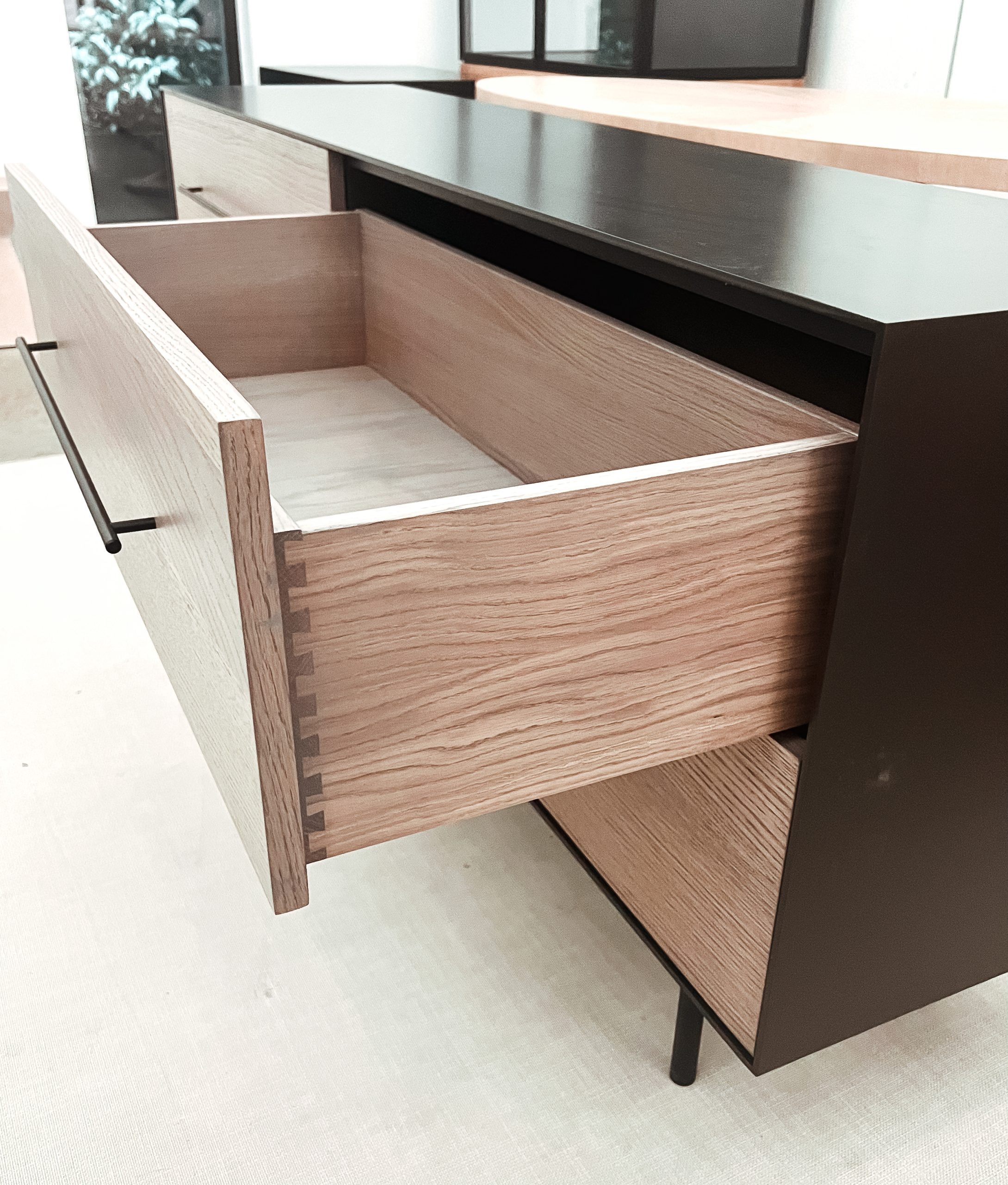 drawer of steel and grayed oak credenza