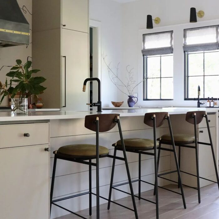 Kitchen cabinetry with subtle brass details