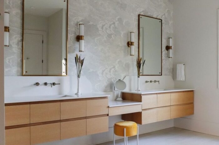 Floating bathroom cabinetry in a natural finish that we made for this beautiful master bath. ⁠