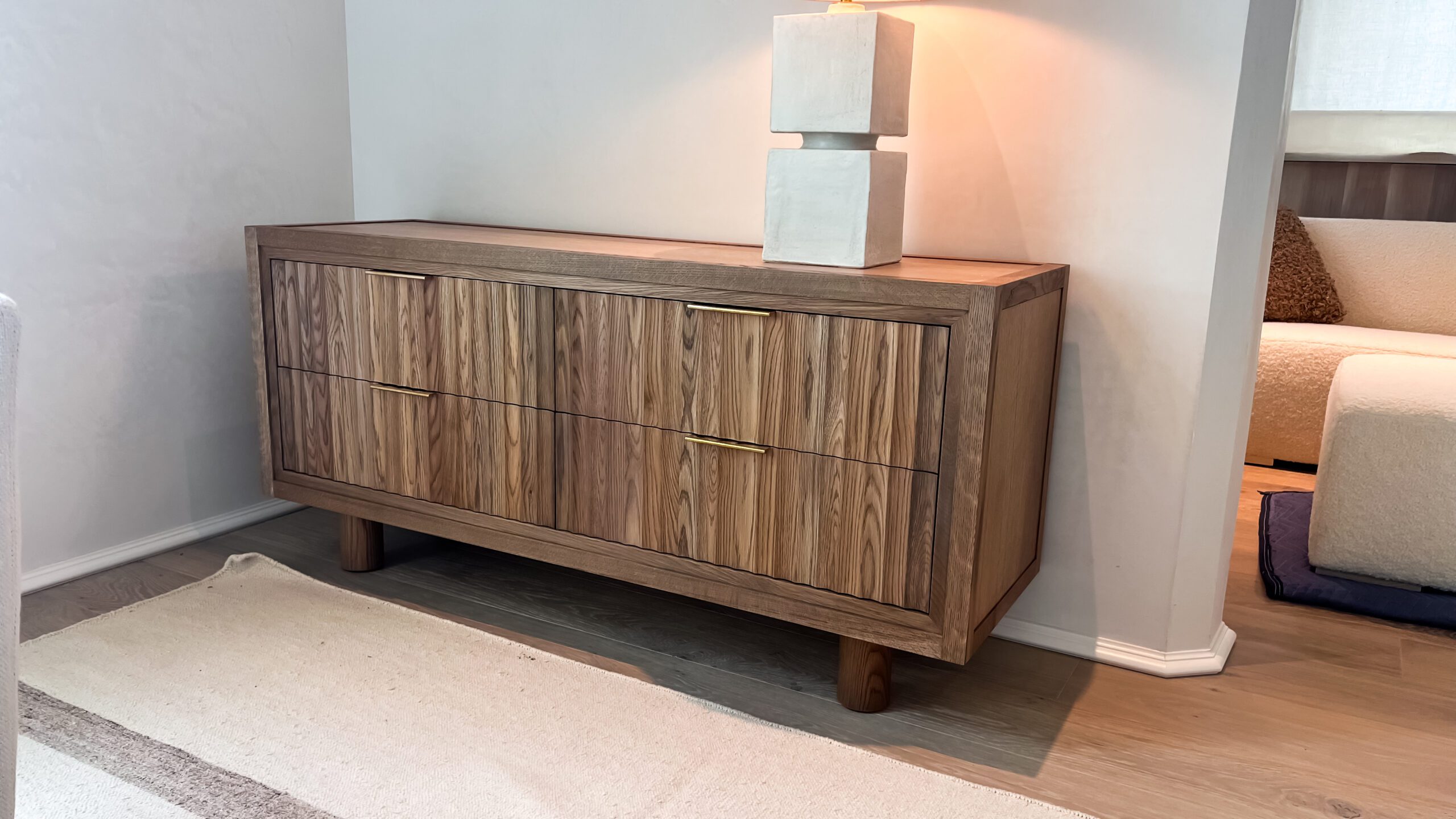 Fluted credenza with white oak and solid brass pulls