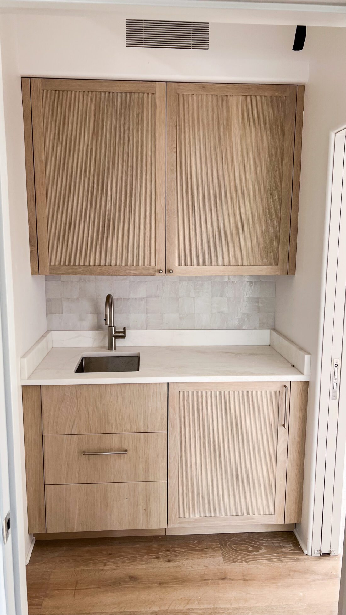 Reeded cabinetry in Alys Beach