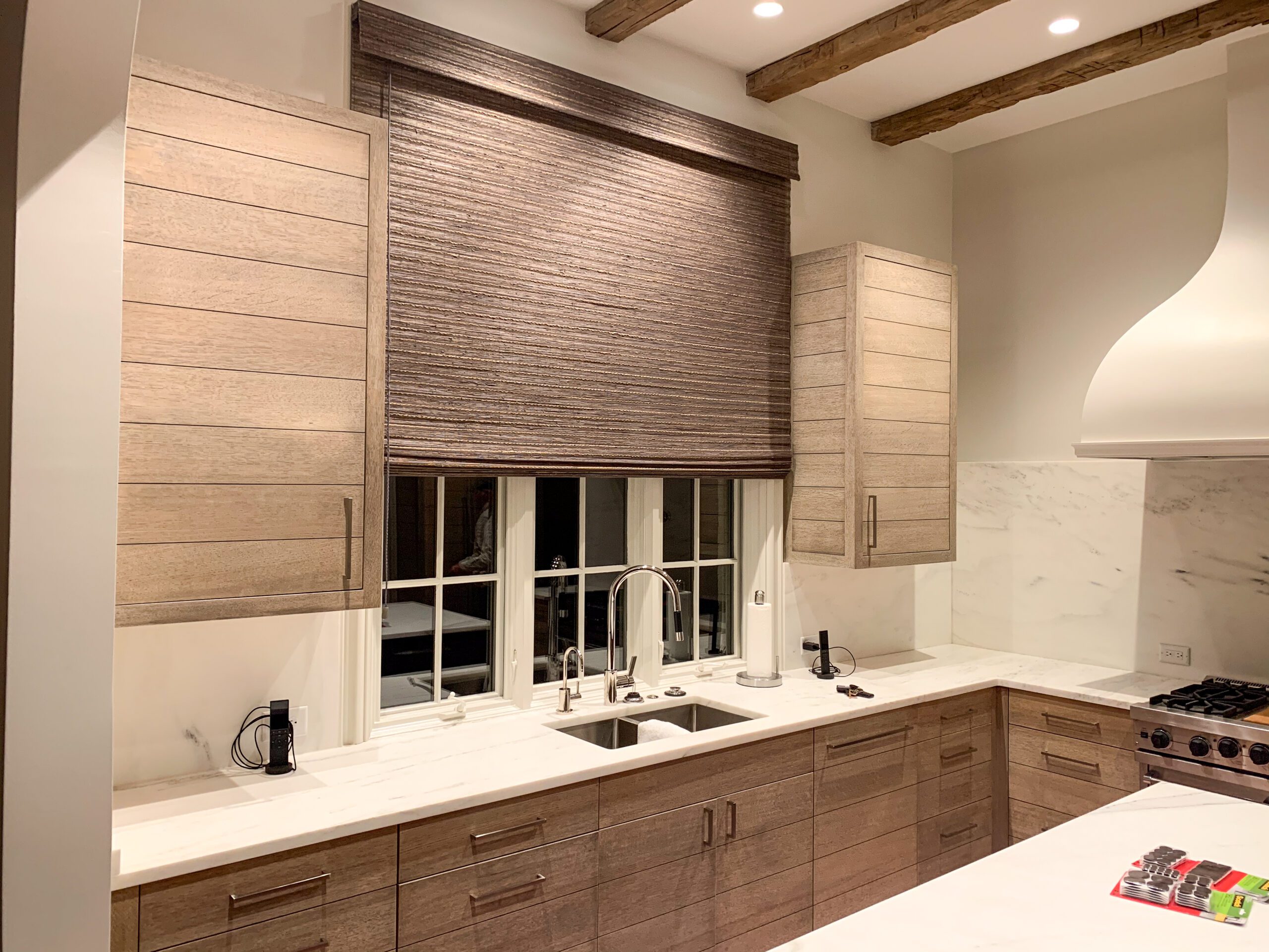 horizontal striped white oak cabinetry in custom kitchen by mdm design studio