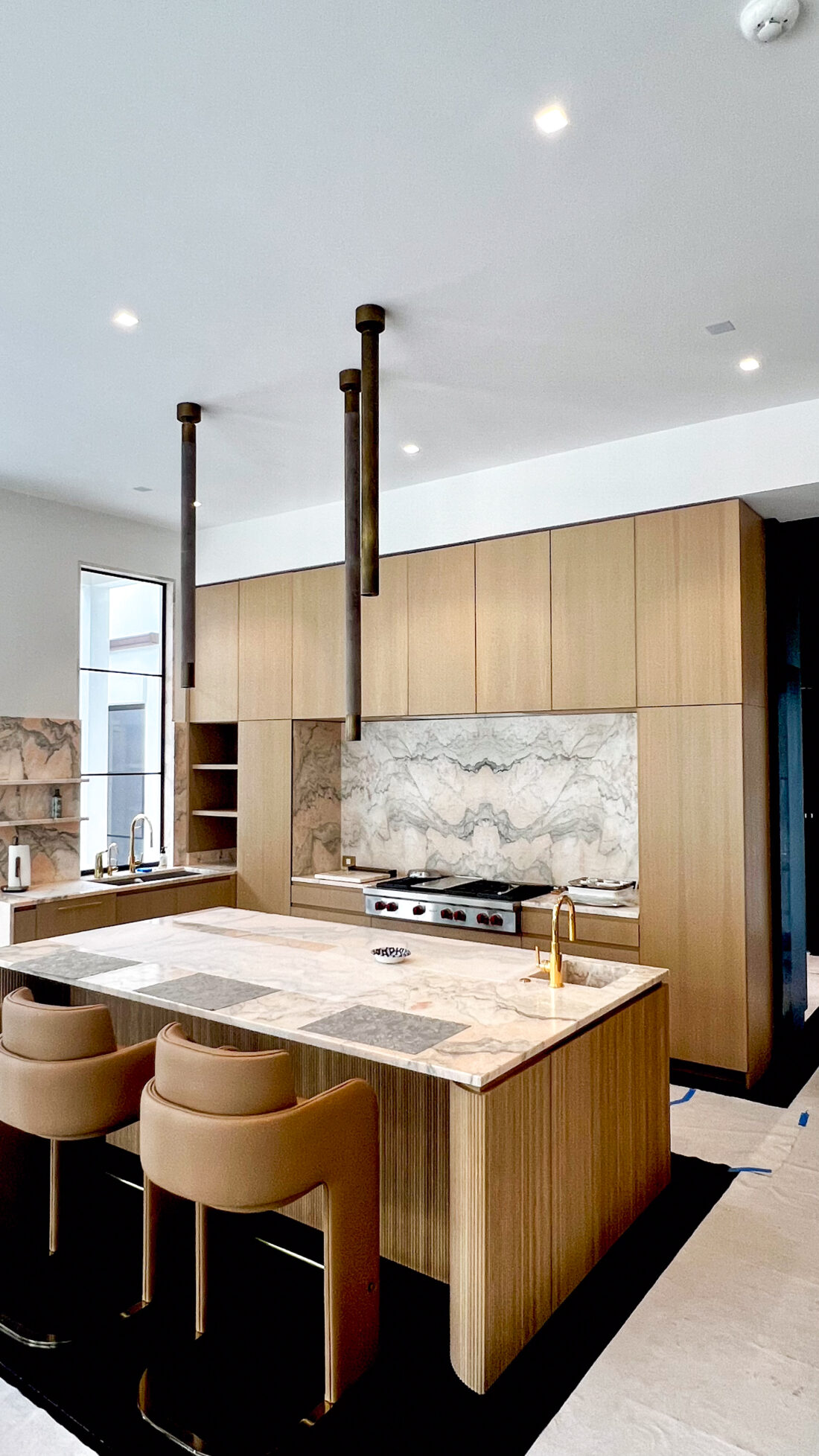 reeded white oak kitchen cabinetry in freshly renovated kitchen by MDM Design Studio