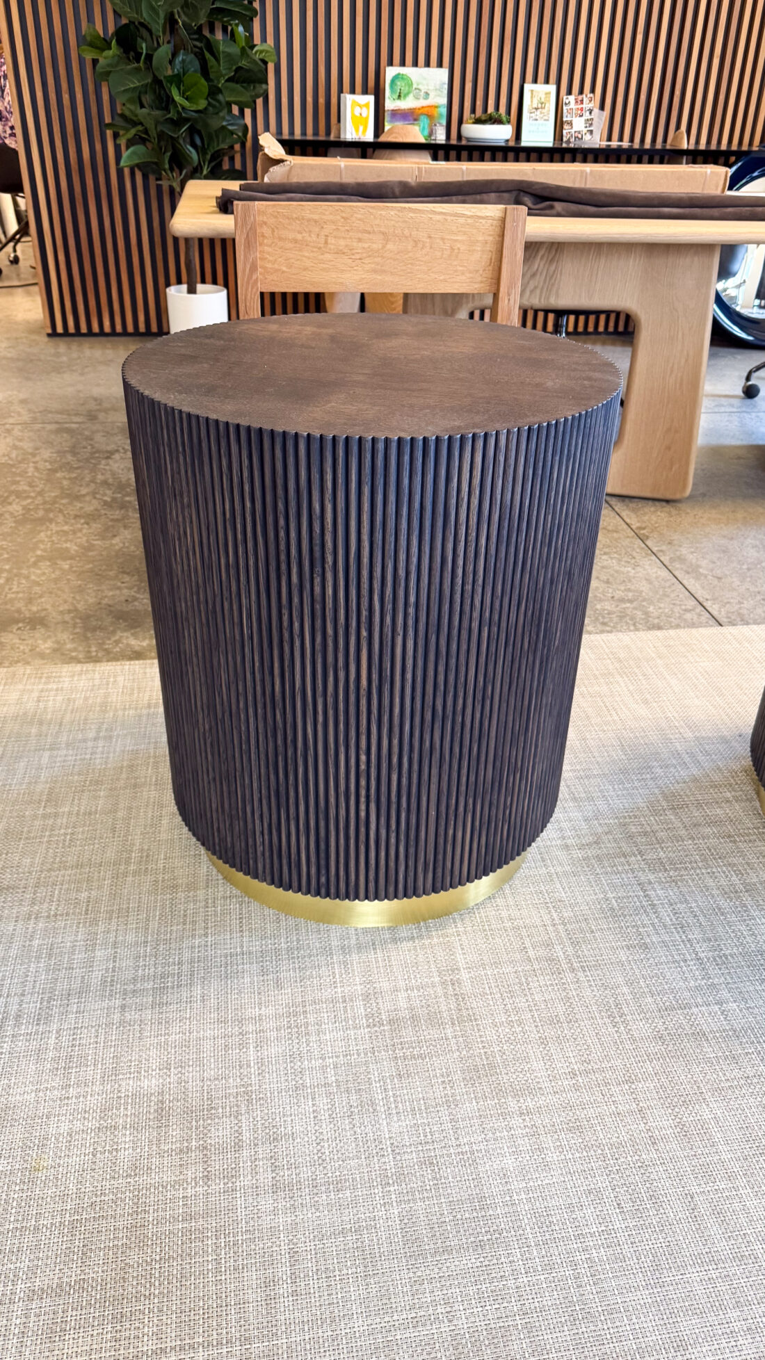 Round reeded gray oak side table with brass base